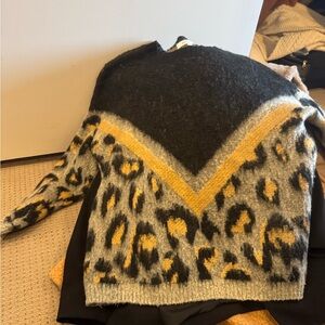 Size medium women’s sweater/jackets